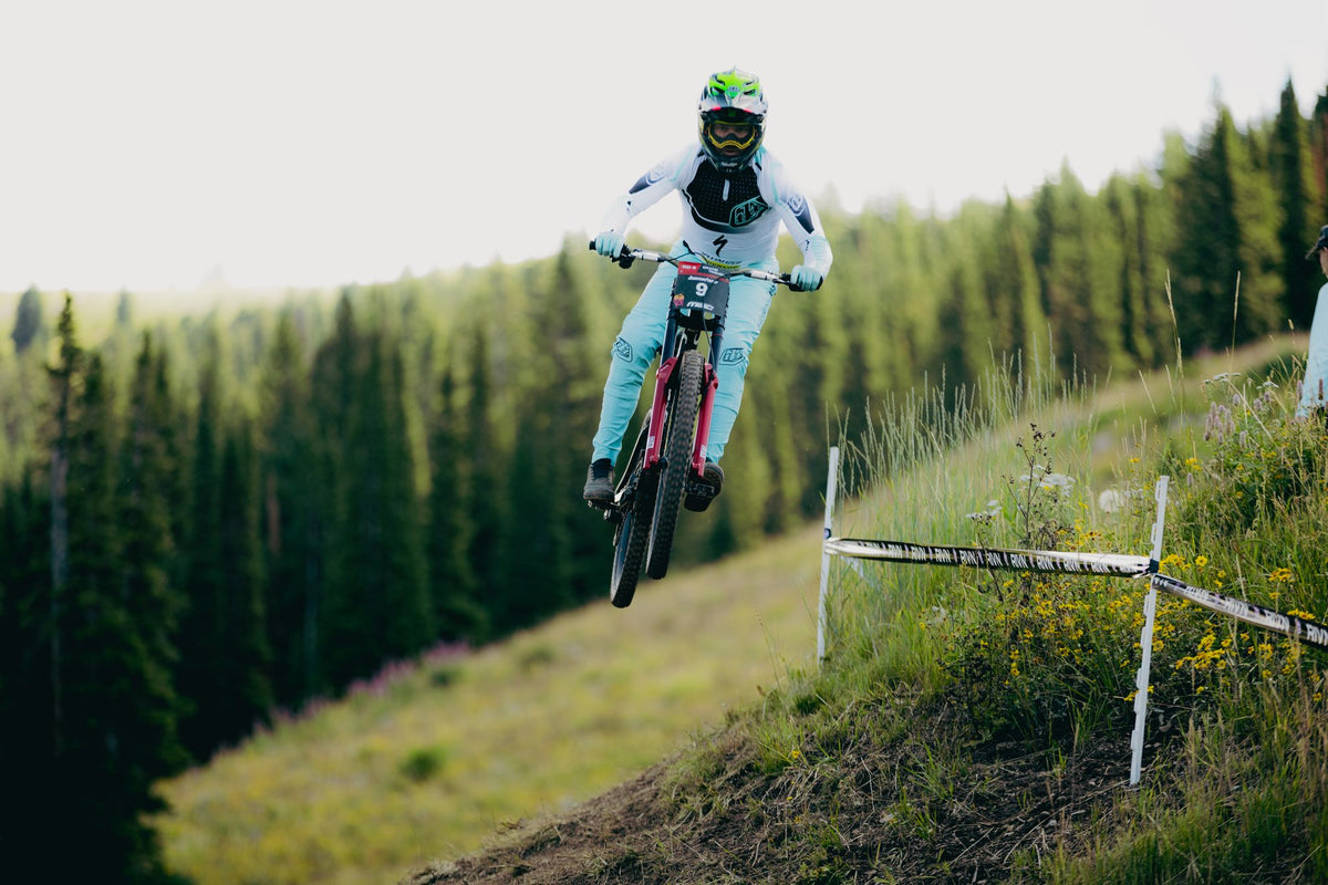 A rider in the air over the meadow at Grand Targhee